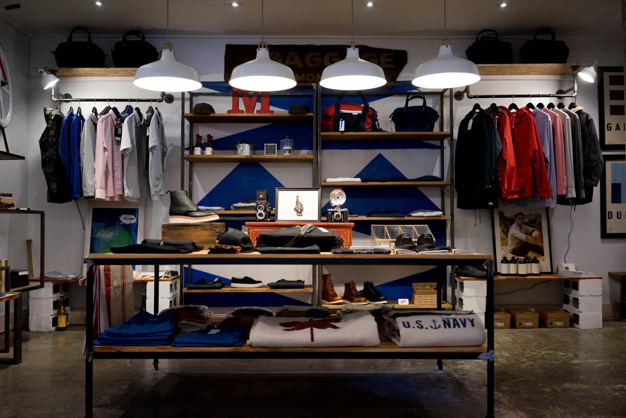 Clothing store interior with rails of shirts